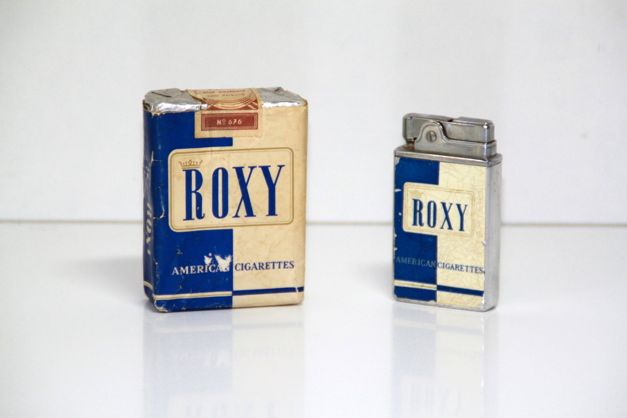 Roxy benzineaansteker mét muziekdoos 1950's !!